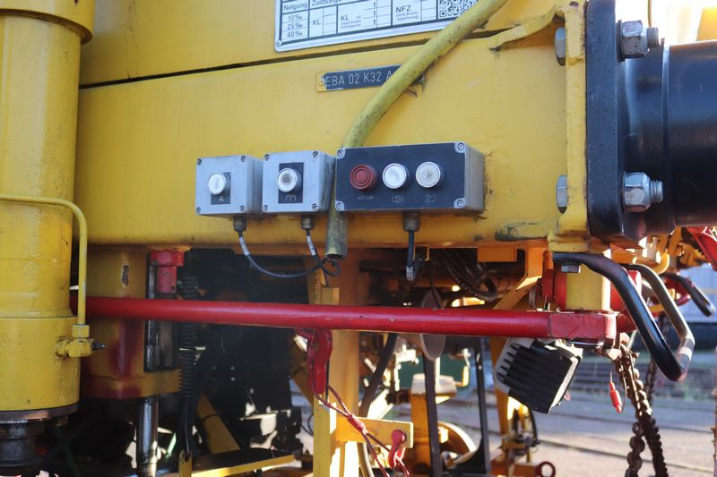 BAM Stopmachine met het fabrieksnummer 1214 en het UIC-nummer 99 84 942 8 702-7.